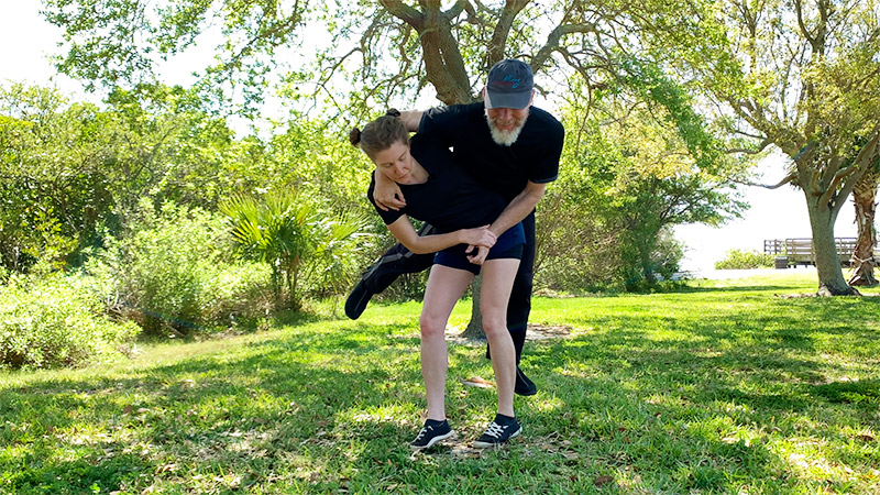 Hip throw on grass