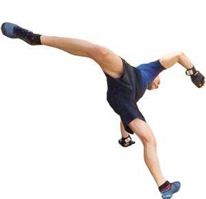 Shaun performing a Capoeira kick